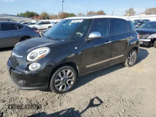 2014 FIAT 500L Lounge with VIN ZFBCFACH4EZ012452, listed as a Copart auction lot 83815124 with 63,341 mi miles and Salvage Title. Bid and sale history available at DreamBid. Image 1.