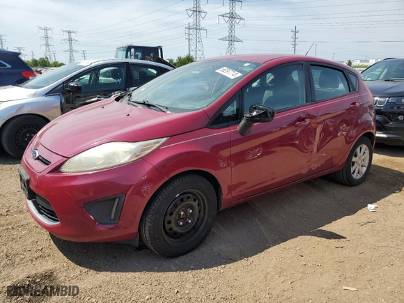 2011 Ford Fiesta SE with VIN 3FADP4EJ7BM108577, listed as a Copart auction lot 66297714 with 136,344 mi miles and Clean Title. Bid and sale history available at carsss.com. Image 1.