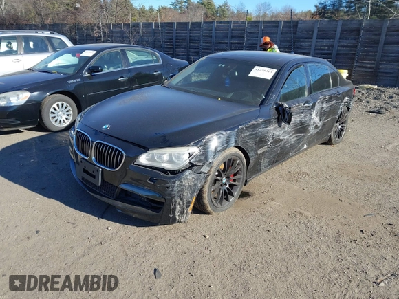2015 BMW 7 Series 750Li xDrive with VIN WBAYF8C56FD654698, listed as a IAAI auction lot 41229313 with 120,238 mi miles and . Bid and sale history available at carsss.com. Image 2.