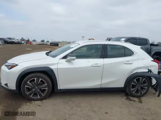 2022 Lexus UX with VIN JTHX3JBH2N2052061, listed as a IAAI auction lot 41878323 with 36,902 mi miles. Bid and sale history available at carsss.com. Image 14.