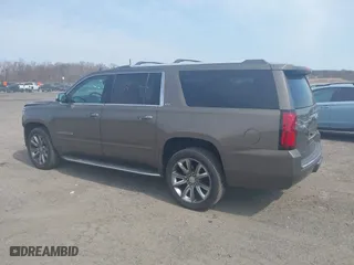 2016 Chevrolet Suburban LTZ with VIN 1GNSKJKC9GR255307, listed as a IAAI auction lot 41785233 with 202,101 mi miles. Bid and sale history available at carsss.com. Image 14.