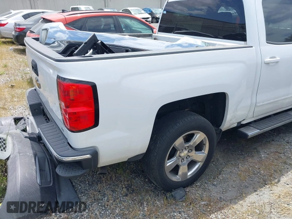 2017 Chevrolet Silverado 1500 LT with VIN 3GCPCRECXHG344049, listed as a IAAI auction lot 41803518 with 205,643 mi miles. Bid and sale history available at carsss.com. Image 4.