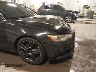 2015 Audi A6 2.0T Premium Plus with VIN WAUGFAFC7FN012983, listed as a IAAI auction lot 41086404 with 145,358 mi miles. Bid and sale history available at carsss.com. Image 6.