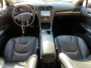 2018 Ford Fusion Titanium с VIN 3FA6P0D92JR192382, выставлен на аукционе Copart как лот 74065774 с пробегом 110 411 миль миль и Списание • Salvage title. История ставок и продаж доступна на DreamBid. Изображение 8.