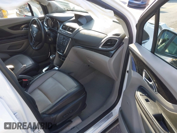 2016 Buick Encore Premium with VIN KL4CJDSB1GB647306, listed as a IAAI auction lot 41983159 with 59,592 mi miles. Bid and sale history available at carsss.com. Image 5.