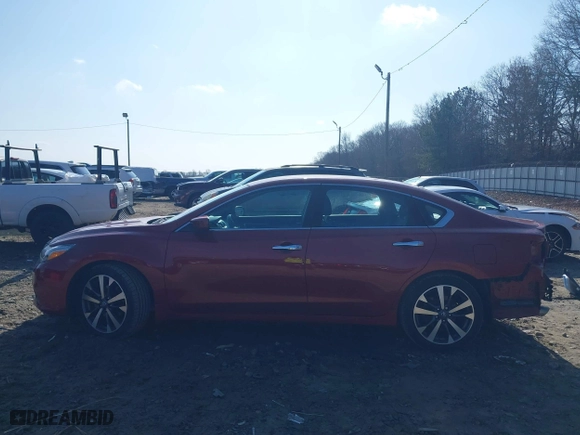 2016 Nissan Altima 2.5 SL with VIN 1N4AL3APXGC281084, listed as a IAAI auction lot 41528669 with 59,201 mi miles. Bid and sale history available at carsss.com. Image 15.