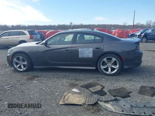 2019 Dodge Charger R/T with VIN 2C3CDXCT9KH575491, listed as a IAAI auction lot 41610688 with 95,725 mi miles and . Bid and sale history available at DreamBid. Image 14.