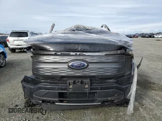 2023 Ford F-150 Lightning Pro с VIN 1FT6W1EV1PWG00813, выставлен на аукционе Copart как лот 44388625 с пробегом Не указан миль и На запчасти • Non repairable. История ставок и продаж доступна на DreamBid. Изображение 5.