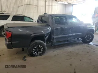 2021 Toyota Tacoma SR with VIN 3TMCZ5AN5MM378375, listed as a Copart auction lot 63806325 with 47,061 mi miles and Salvage title. Bid and sale history available at DreamBid. Image 3.