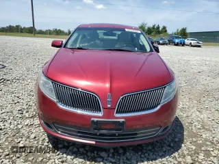 2013 Lincoln MKS z VIN 1LNHL9DK5DG607319, wystawiony jako Copart lot #54302285 z przebiegiem 170 099 mil mil oraz Szkoda całkowita • Salvage title. Historia ofert i sprzedaży dostępna na DreamBid. Obrazek 5.
