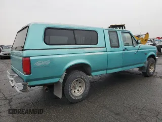 1994 Ford F-150 with VIN 1FTEX14H0RKA94258, listed as a Copart auction lot 83622304 with 206,712 mi miles and Clean title. Bid and sale history available at DreamBid. Image 3.