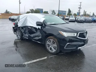 2018 Acura MDX Technology z VIN 5J8YD3H53JL002576, wystawiony jako IAAI lot #41520905 z przebiegiem 143 396 mil mil oraz . Historia ofert i sprzedaży dostępna na DreamBid. Obrazek 1.