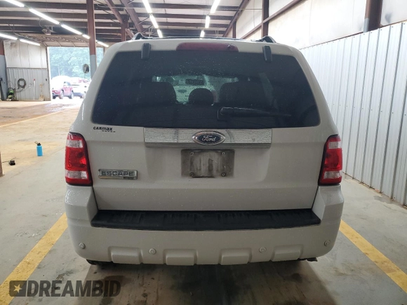 2009 Ford Escape Limited with VIN 1FMCU04759KA79364, listed as a Copart auction lot 56687065 with 186,105 mi miles and Salvage title. Bid and sale history available at DreamBid. Image 6.