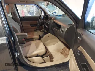 2014 Jeep Patriot Latitude with VIN 1C4NJPFA0ED633657, listed as a IAAI auction lot 41447982 with 104,664 mi miles and . Bid and sale history available at carsss.com. Image 5.