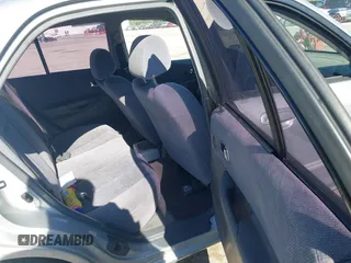 2000 Mazda Protege ES with VIN JM1BJ2213Y0284890, listed as a IAAI auction lot 42088671 with 215,104 mi miles and . Bid and sale history available at DreamBid. Image 8.