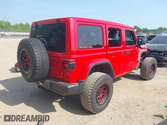2022 Jeep Wrangler Unlimited Rubicon with VIN 1C4HJXFG0NW100620, listed as a IAAI auction lot 42534993 with 21,614 mi miles and . Bid and sale history available at DreamBid. Image 4.