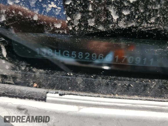 2006 Jeep Commander Limited with VIN 1J8HG58296C170911, listed as a Copart auction lot 59883355 with 112,860 mi miles and Salvage title. Bid and sale history available at DreamBid. Image 13.