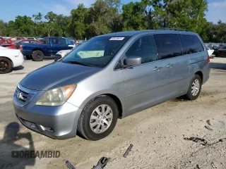 2009 Honda Odyssey EX-L with VIN 5FNRL38749B006271, listed as a Copart auction lot 50619625 with 210,017 mi miles and Salvage Title. Bid and sale history available at carsss.com. Image 1.