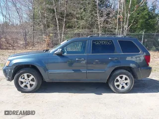 2008 Jeep Grand Cherokee Laredo with VIN 1J8GR48K98C161239, listed as a IAAI auction lot 42090850 with 218,063 mi miles. Bid and sale history available at carsss.com. Image 12.