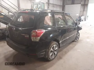2017 Subaru Forester with VIN JF2SJABC5HH589516, listed as a IAAI auction lot 41951650 with 123,847 mi miles. Bid and sale history available at carsss.com. Image 4.