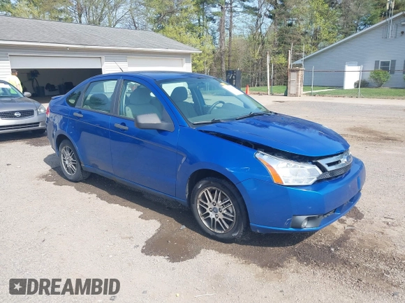 2010 Ford Focus SE with VIN 1FAHP3FNXAW159048, listed as a IAAI auction lot 42103062 with 142,810 mi miles. Bid and sale history available at carsss.com. Image 1.