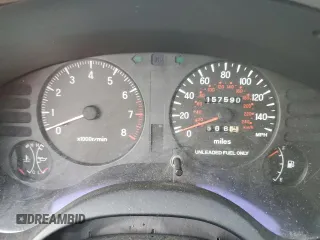 1997 Chrysler Sebring LXi z VIN 4C3AU52N2VE183090, wystawiony jako Copart lot #81855454 z przebiegiem 157 590 mil mil oraz Szkoda całkowita • Salvage title. Historia ofert i sprzedaży dostępna na DreamBid. Obrazek 9.
