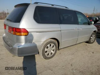2004 Honda Odyssey EX-L with VIN 5FNRL18994B136383, listed as a Copart auction lot 48235275 with 188,030 mi miles and Salvage Title. Bid and sale history available at DreamBid. Image 3.
