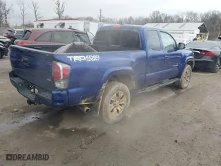 2022 Toyota Tacoma 4WD SR with VIN 3TYSZ5AN1NT098292, listed as a IAAI auction lot 41145029 with 48,853 mi miles. Bid and sale history available at carsss.com. Image 4.