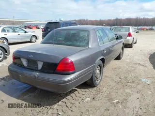 2007 Ford Police Interceptor z VIN 2FAFP71W97X155407, wystawiony jako IAAI lot #41881583 z przebiegiem Nie podano mil oraz . Historia ofert i sprzedaży dostępna na DreamBid. Obrazek 4.