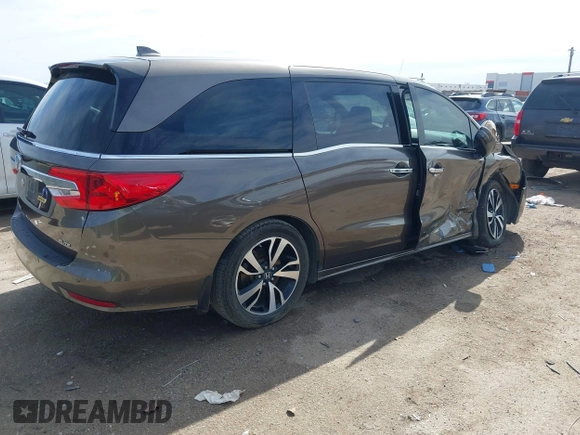 2018 Honda Odyssey Elite with VIN 5FNRL6H96JB069458, listed as a IAAI auction lot 41687526 with 41,004 mi miles and . Bid and sale history available at DreamBid. Image 4.