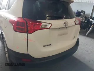 2014 Toyota RAV4 LE with VIN JTMBFREV8EJ005559, listed as a IAAI auction lot 41963080 with 126,296 mi miles and . Bid and sale history available at DreamBid. Image 21.