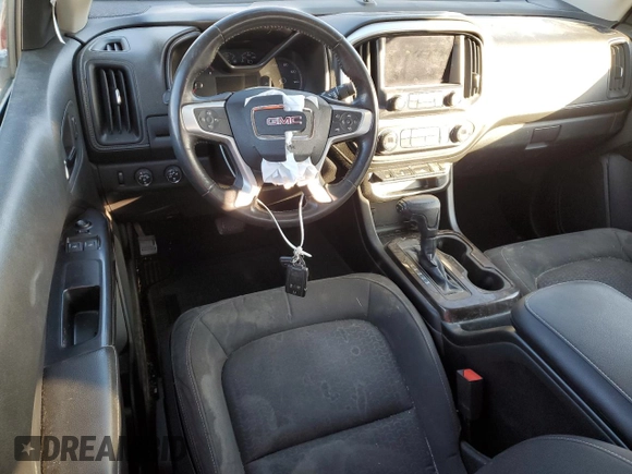 2015 GMC Canyon 4WD SLE with VIN 1GTH6BE3XF1180185, listed as a Copart auction lot 89046915 with 0 mi miles and Salvage Title. Bid and sale history available at carsss.com. Image 8.