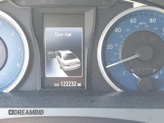 2015 Toyota Camry XLE with VIN 4T1BF1FKXFU881017, listed as a IAAI auction lot 42054825 with 122,232 mi miles and . Bid and sale history available at DreamBid. Image 16.