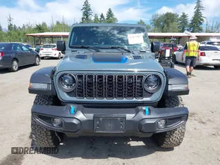 2024 Jeep Wrangler Rubicon X z VIN 1C4RJXR6XRW240316, wystawiony jako IAAI lot #42477607 z przebiegiem 41 375 mil mil oraz . Historia ofert i sprzedaży dostępna na DreamBid. Obrazek 12.