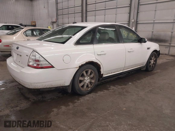 2008 Ford Taurus SEL with VIN 1FAHP24W78G116815, listed as a IAAI auction lot 42714944 with 206,736 mi miles and . Bid and sale history available at DreamBid. Image 4.