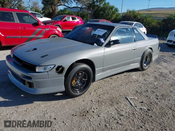 1992 Nissan 240SX z VIN JN1MS34P9NW100593, wystawiony jako IAAI lot #40867667 z przebiegiem Nie podano mil oraz . Historia ofert i sprzedaży dostępna na DreamBid. Obrazek 2.