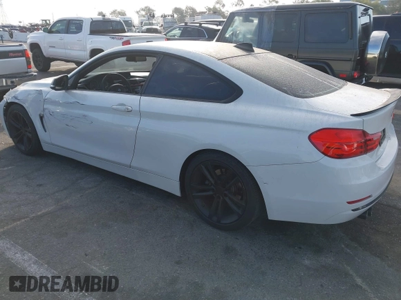 2014 BMW 4 Series 428i with VIN WBA3N3C5XEF710869, listed as a IAAI auction lot 40984116 with 115,958 mi miles and . Bid and sale history available at DreamBid. Image 3.