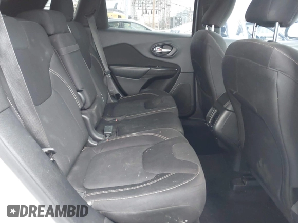 2015 Jeep Cherokee Latitude with VIN 1C4PJLCB5FW642701, listed as a IAAI auction lot 42063262 with 142,501 mi miles and . Bid and sale history available at carsss.com. Image 8.