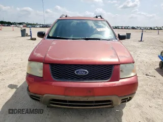 2005 Ford Freestyle SE with VIN 1FMZK01105GA54885, listed as a Copart auction lot 58414145 with 306,275 mi miles and Salvage title. Bid and sale history available at DreamBid. Image 5.