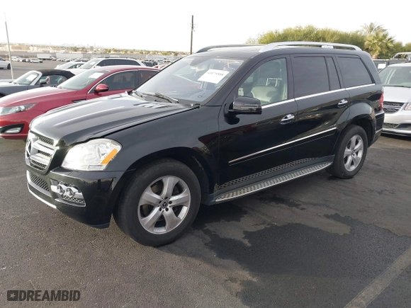 2011 Mercedes-Benz GL-Class GL 450 with VIN 4JGBF7BE1BA752615, listed as a IAAI auction lot 41075508 with 165,605 mi miles. Bid and sale history available at carsss.com. Image 2.
