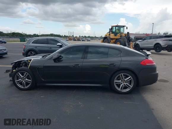 2015 Porsche Panamera 4 с VIN WP0AA2A71FL002436, выставлен на аукционе IAAI как лот 42479904 с пробегом 64 750 миль миль и . История ставок и продаж доступна на DreamBid. Изображение 15.