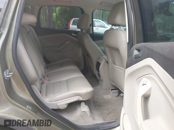 2014 Ford Escape Titanium with VIN 1FMCU9JX9EUB23972, listed as a IAAI auction lot 42217298 with 164,556 mi miles and . Bid and sale history available at DreamBid. Image 8.
