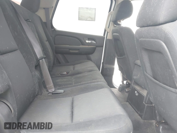 2012 Chevrolet Tahoe LS z VIN 1GNSKAE00CR283377, wystawiony jako IAAI lot #41848535 z przebiegiem Nie podano mil oraz . Historia ofert i sprzedaży dostępna na DreamBid. Obrazek 8.