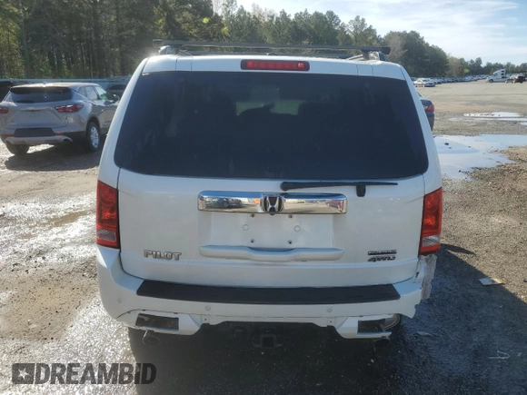 2013 Honda Pilot Touring with VIN 5FNYF4H92DB031771, listed as a Copart auction lot 50083125 with 229,059 mi miles and Salvage Title. Bid and sale history available at DreamBid. Image 6.
