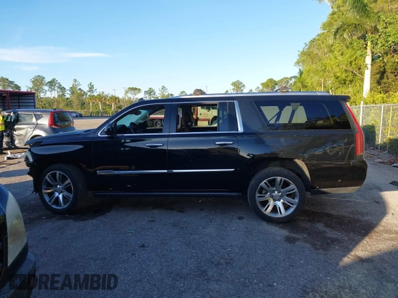 2015 Cadillac Escalade ESV Premium z VIN 1GYS4JKJXFR291842, wystawiony jako IAAI lot #41235490 z przebiegiem 115 037 mil mil oraz . Historia ofert i sprzedaży dostępna na DreamBid. Obrazek 15.