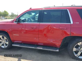 2015 Chevrolet Tahoe LT with VIN 1GNSKBKC6FR628355, listed as a IAAI auction lot 42159743 with 95,730 mi miles and . Bid and sale history available at DreamBid. Image 14.