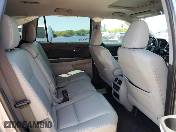 2020 Honda Pilot EX-L с VIN 5FNYF5H59LB010398, выставлен на аукционе Copart как лот 51812005 с пробегом 81 000 миль миль и Списание • Salvage title. История ставок и продаж доступна на DreamBid. Изображение 11.