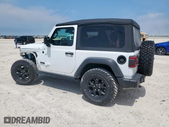 2022 Jeep Wrangler Sport S with VIN 1C4GJXAG5NW259605, listed as a Copart auction lot 57659775 with 14,864 mi miles and Salvage title. Bid and sale history available at DreamBid. Image 2.