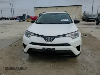 2016 Toyota RAV4 LE with VIN JTMZFREV3GJ088139, listed as a Copart auction lot 51243455 with 130,819 mi miles and Salvage Title. Bid and sale history available at carsss.com. Image 15.