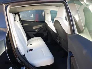 2023 Tesla Model Y Long Range z VIN 7SAYGDEE9PF637042, wystawiony jako IAAI lot #41969086 z przebiegiem 25 524 mil mil oraz . Historia ofert i sprzedaży dostępna na DreamBid. Obrazek 8.